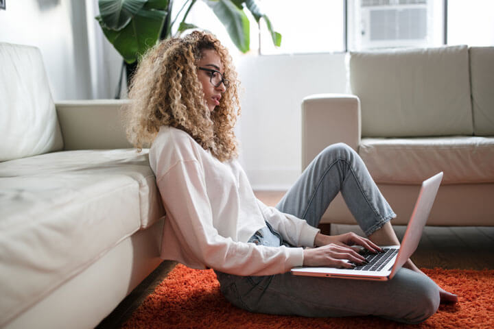 Woman working at home as a member of remote teams